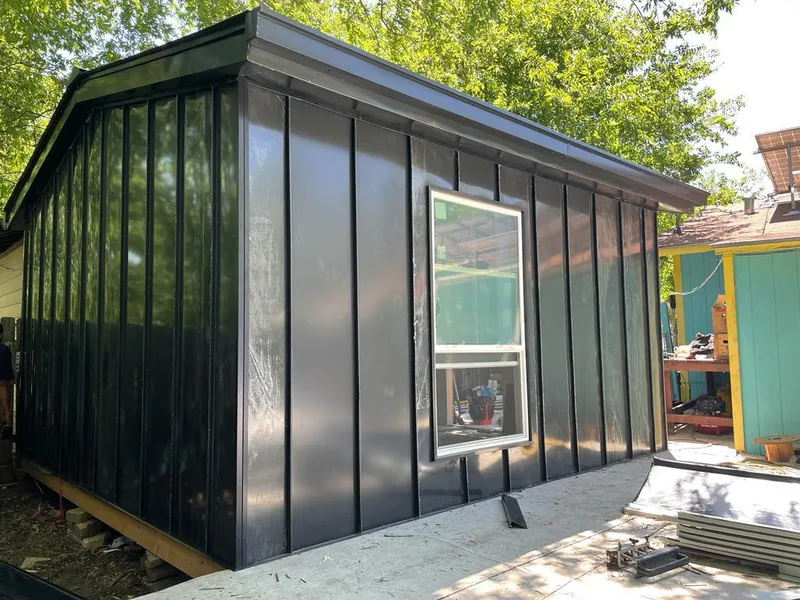 Black standing seam metal wall panels for Roof Inspection in Closter